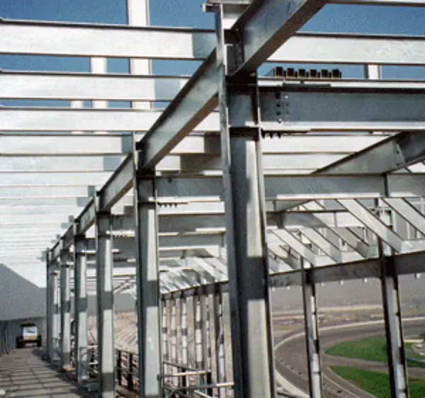 Inspector measuring hot-dip galvanized zinc coating thickness per ASTM A123 using a magnetic thickness gauge