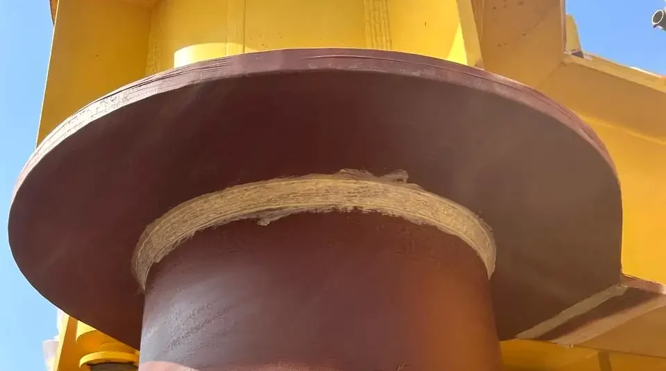 Completed stripe coat applied on weld and edge area of steel structure for corrosion protection.